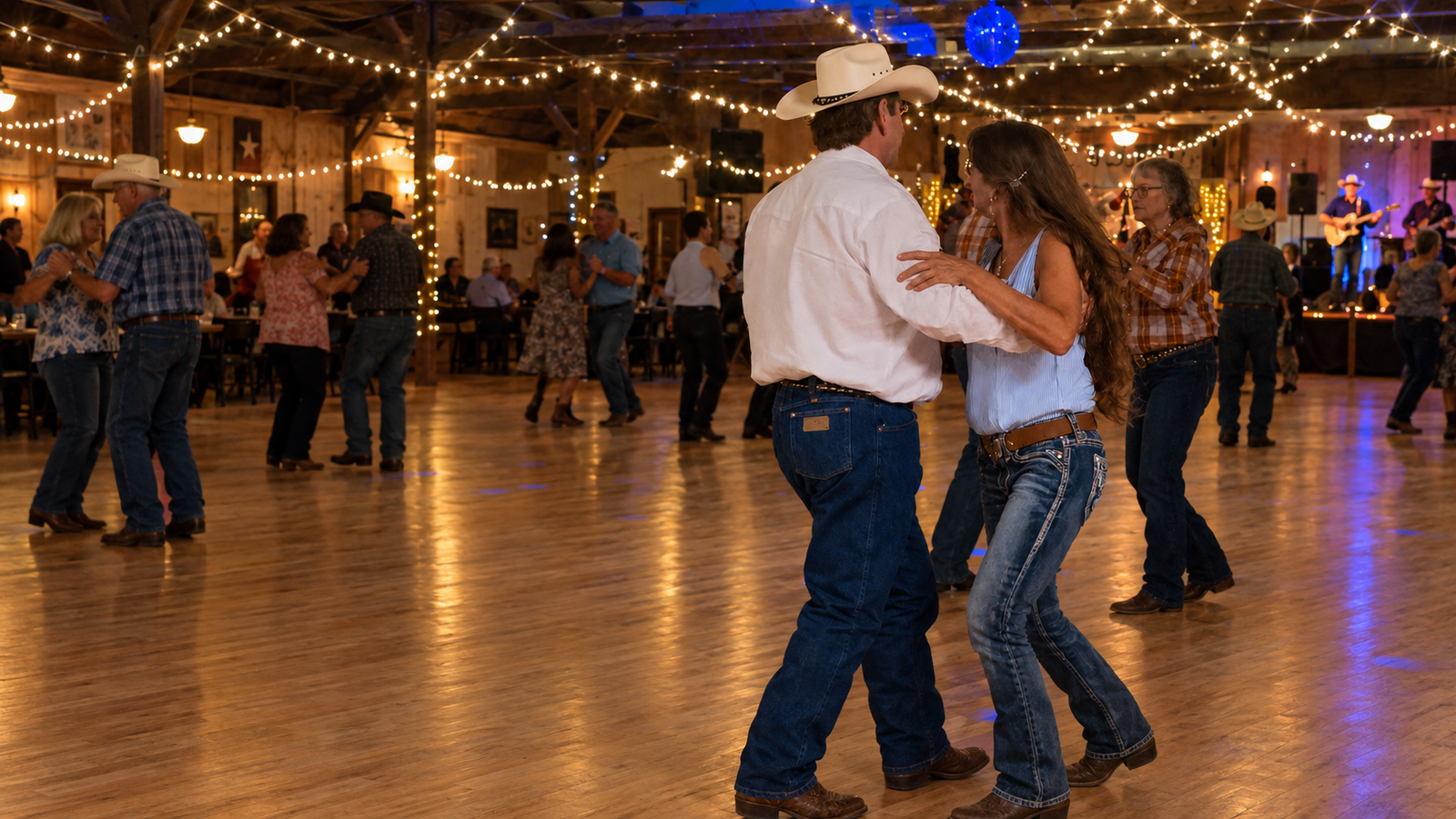 Cowboy partners dancing in a working barn